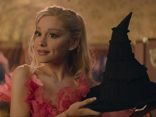 Glinda holding hat