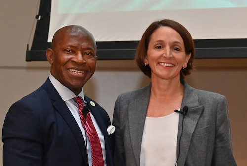 SUNY Oswego President Peter O. Nwosu, left, and National Grid New York President Sally Librera