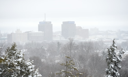 File photo as light snow falls over downtown Syracuse. Dennis Nett | dnett@syracuse.com