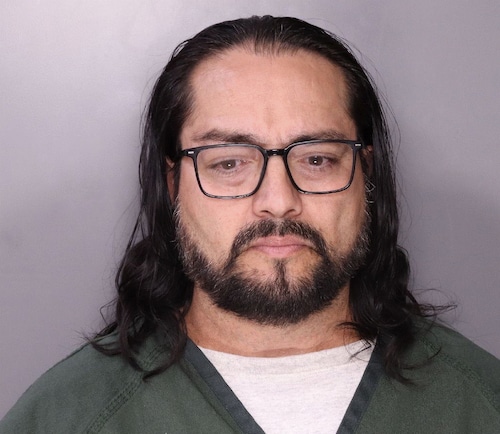 Jaime Perez-Garcia, 54, is accused of drinking with a 15-year-old girl in the parking lot of Corcoran High School. He is charged with endangering the welfare of a child.