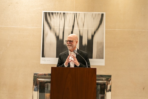 Bruce Strong shared his experiences documenting life in the Balkans at the opening of his new photo exhibit.