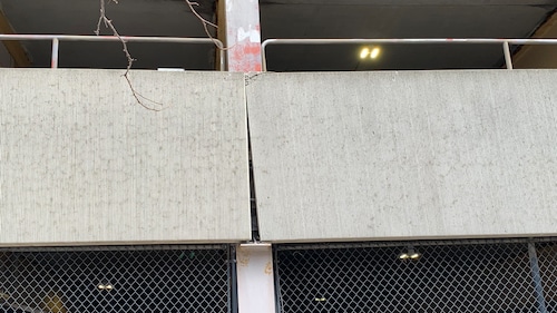 Two concrete panels on the city of Syracuse Fayette Street parking garage show signs of separating after a steel beam they were attached to sank 9 inches. The city closed the 550-car garage on Nov. 6 after the structural problem was detected. (Rick Moriarty | rmoriarty@syracuse.com)