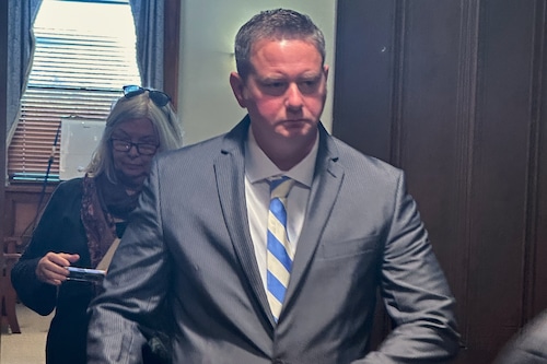 Former New York State Trooper Christopher Baldner, who is charged in the death of an 11-year-old girl, leaves the court room during his trial Tuesday, Oct. 28, 2025 in Kingston, N.Y. (AP Photo/Michael Hill)