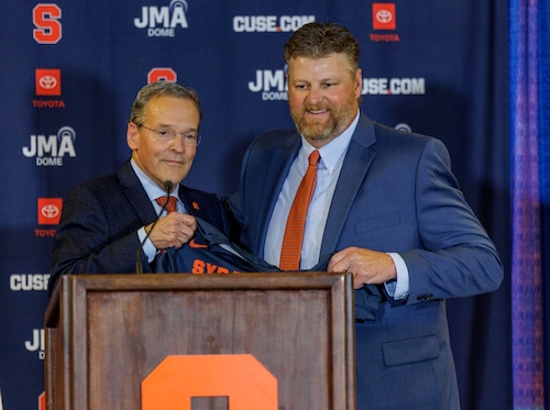 Syracuse Athletic Director John Wildhack officially introduces Regy Thorpe as the new women’s lacrosse coach for Syracuse University at the Lally Athletics Complex Wednesday, June 18, 2025. Thorpe picked up a big commitment from goaltender Piper Dalsemer (N. Scott Trimble | strimble@syracuse.com)