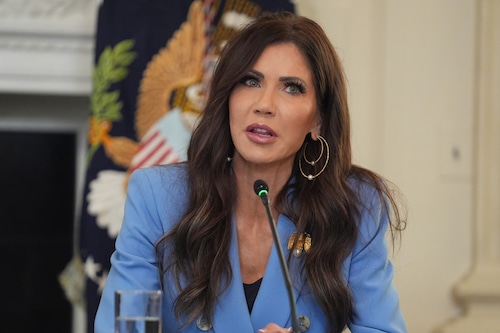 Homeland Security Secretary Kristi Noem speaks during a roundtable meeting with President Donald Trump in the State Dining Room at the White House, Wednesday, Oct. 8, 2025, in Washington. (AP Photo/Evan Vucci)