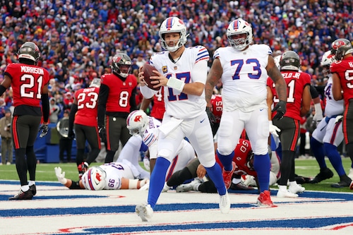 Buffalo Bills quarterback Josh Allen (17) reacts after scoring a touchdown against the Tampa Bay Buccaneers during the first half of an NFL football game, Sunday, Nov. 16, 2025, in Orchard Park, N.Y. (AP Photo/Jeffrey T. Barnes)