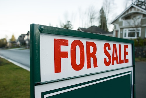 A for sale sign is seen