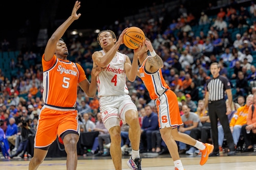Syracuse forward Tyler Betsey defends Houston guard Kingston Flemings in the first half of Monday's game in the Players Era Festival in Las Vegas.
 (N. Scott Trimble | strimble@syracuse.com)