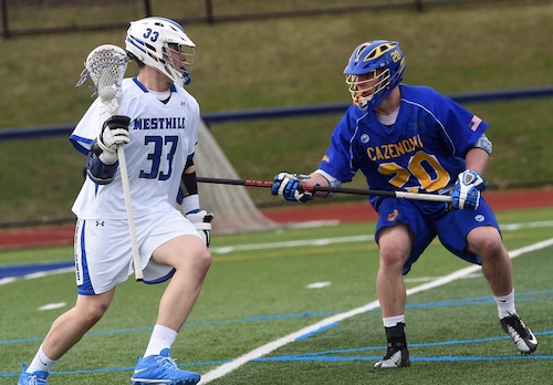 Westhill's Casey Rogers and Cazenovia's Kevin Frega in the 3rd period of Cazenovia at Westhill boys lacrosse, Tuesday, April 14, 2015. Gary Walts | gwalts@syracuse.com