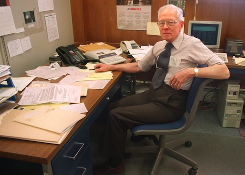 Carl Sterling was still busy at his desk shortly after announcing his retirement as East Syracuse's village clerk in 1995. He served at the position for over 20 years.