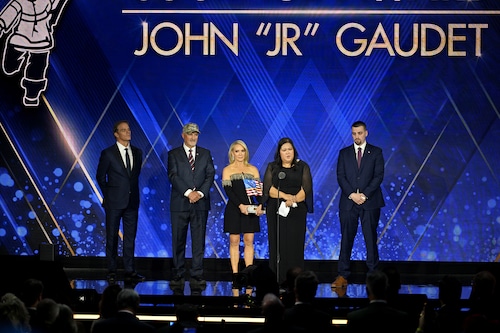 Bill Hemmer, Frank Siller, Dana Perino, and Stephen Siller Jr: present the Tunnels to Towers Foundation Stephen Siller Courage Award to Felly Gaudet, widow of John "JR" Gaudet, onstage during the 2025 Fox Nation Patriot Awards at Tilles Center for the Performing Arts on November 06, 2025 in Greenvale, New York.  Roy Rochlin | Getty Images
