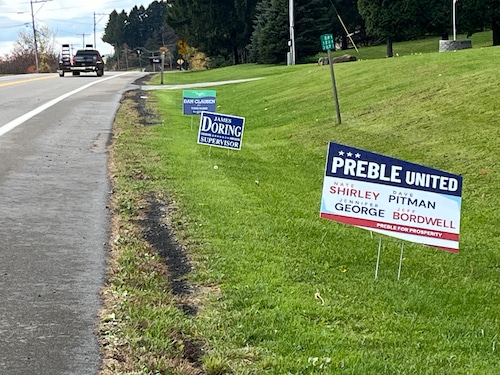 Competing signs around Song Lake as residents took sides in the Airbnb controversy in Preble. The issue became a major campaign topic in Tuesday's election. (Teri Weaver|tweaver@syracuse.com)