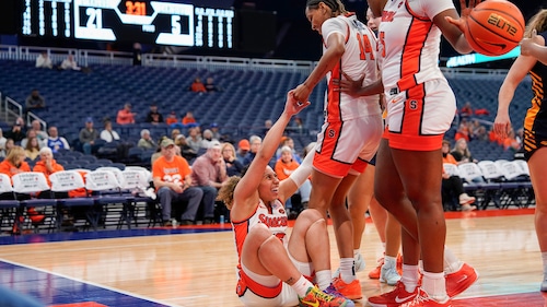 Angelica Velez, of the Syracuse women's basketball team, is helped up during a game against Canisius on Tuesday, Nov. 11, 2025, at the JMA Wireless Dome. (Courtesy Syracuse Athletics)