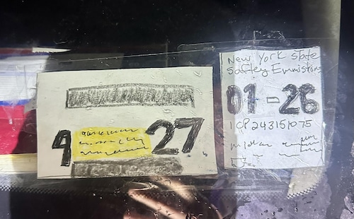 This photo provided by New York State Police shows fake inspection and registration stickers written in crayon, pen and marker. The driver was issued multiple tickets and the vehicle was taken off the road Thursday, Nov. 20, 2025.