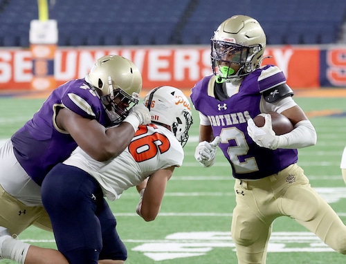 Christian Brothers Academy running back Isaiah Coleman, shown here in the Section III Class AA title game vs. Liverpool, was one of six Brothers to score a touchdown in the team's 42-7 triumph over Elmira in a state regional game Saturday.