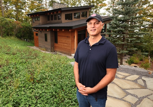  Portrait of the builder, Josh Stack, standing near a recently completed all-electric home. 1737 Russell's Landing, Skaneateles, NY.  Sept. 24, 2025. Dennis Nett | dnett@syracuse.com