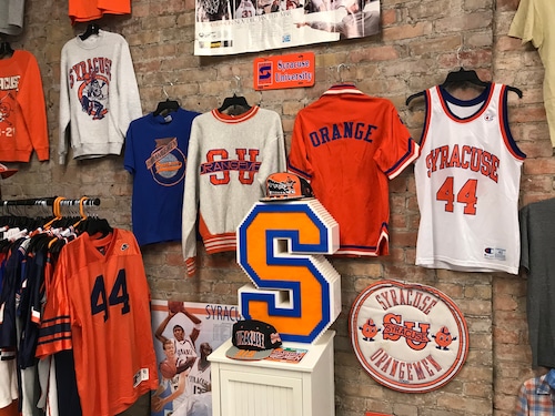 Vintage Syracuse University merchandise on display at Scholars and Champs in downtown Syracuse.