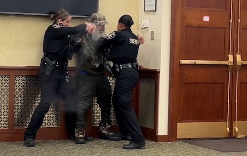 A hearing about Onondaga County's efforts to evict a 91-year-old widow from her home in the town of Clay to make way for the Micron Technology project ended with pepper spray and a man detained by deputies on Thursday, Nov. 20, 2025. Glenn Coin | gcoin@syracuse.com