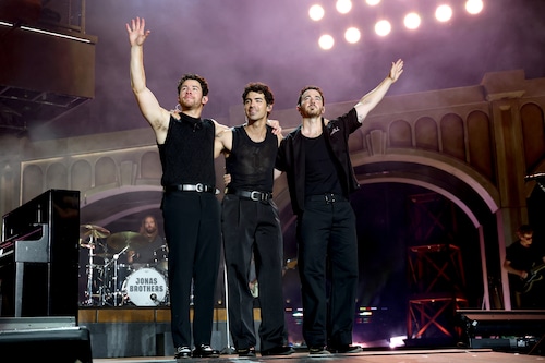(L-R) Nick Jonas, Joe Jonas, and Kevin Jonas perform onstage during the Jonas Brothers: JONAS20 Greetings From Your Hometown tour kick off at Met Life Stadium on August 10, 2025 in East Rutherford, New Jersey. Kevin Mazur | Getty Images for Live Nation