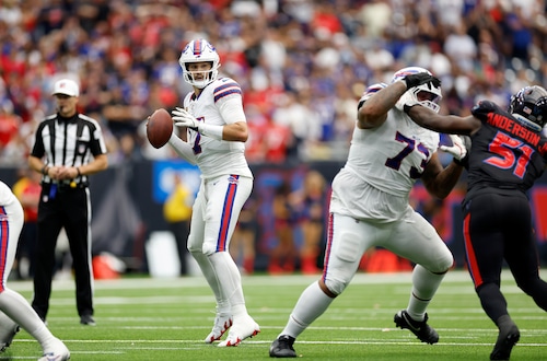 Josh Allen leads the Buffalo Bills against the Houston Texans at NRG Stadium on Thursday Night Football in NFL week 12. Explore the latest odds, predictions and best bets for this ballgame. (Photo by Tim Warner/Getty Images)