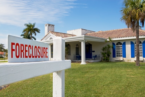 Foreclosures in most New York metro areas, including Syracuse, fell in the third quarter when compared with the same period last year, according to new data. Stock photo. (fotog | Getty Images)