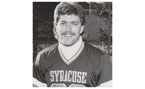 Mark Burnam was a member of Syracuse's first national championship squad in 1983 and a member of its runner-up team in 1984.