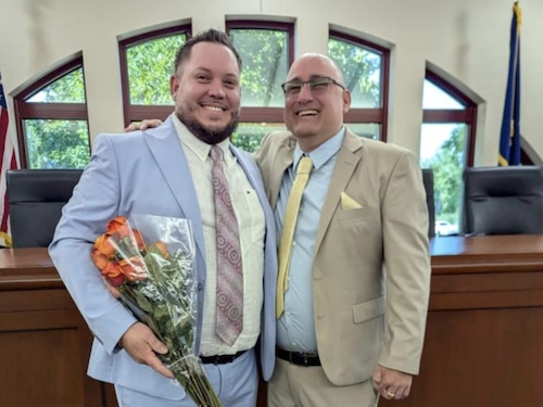 Yannier Vazquez Hidalgo and Alcibiades Lazaro Ramirez Gonzalez pose after their wedding. They were arrested by ICE in October.