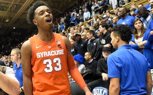 Syracuse forward Elijah Hughes celebrates the Orange's 95-91 overtime win over No. 1 ranked Duke on Jan. 14, 2019, at Cameron Indoor Stadium in Durham, N.C. 
Dennis Nett | dnett@syracuse.com Dennis Nett | dnett@syracuse.com